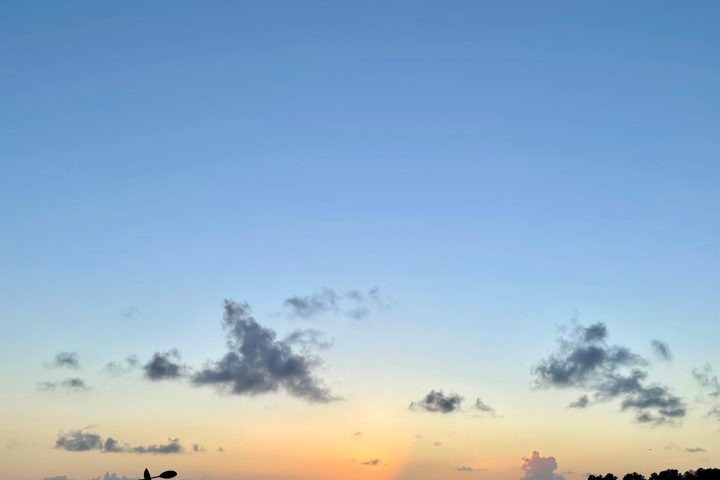 a sunset over a body of water